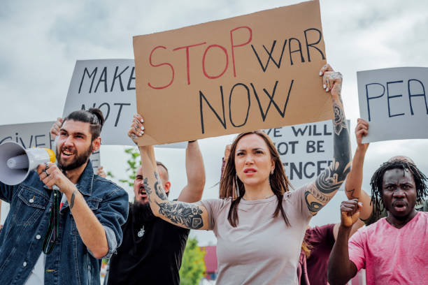 istock People are marching on strike against war 1397033934