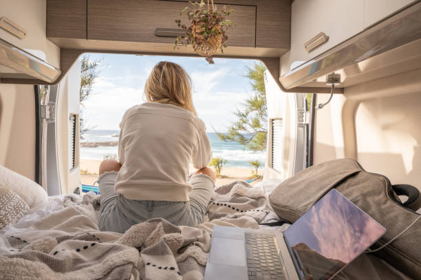 istock Woman working online from her Campervan 1397033966