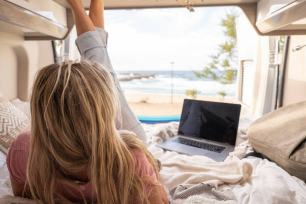 istock Woman working online from her Campervan 1397034319