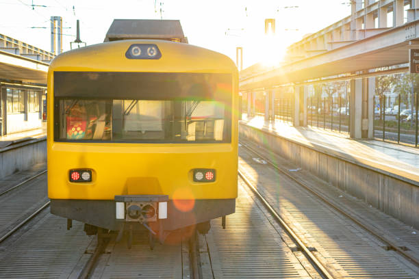 istock Train public transport electric yellow passengers on railway station 1397035101