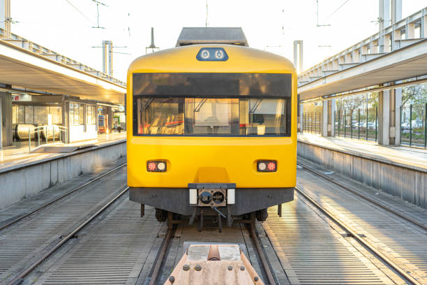 istock Train public transport electric yellow passengers on railway station 1397035112