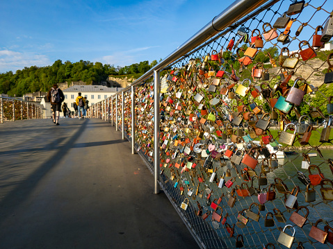 Valentine's Day - many padlocks on a bridge - red padlock with heart in the front