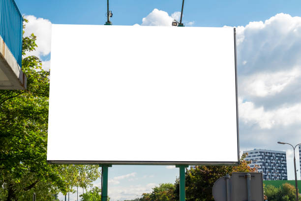 istock Blank white billboard for advertisement on a sunny summer day 1397038084