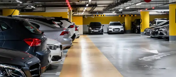 Cars parked in multistorey garage