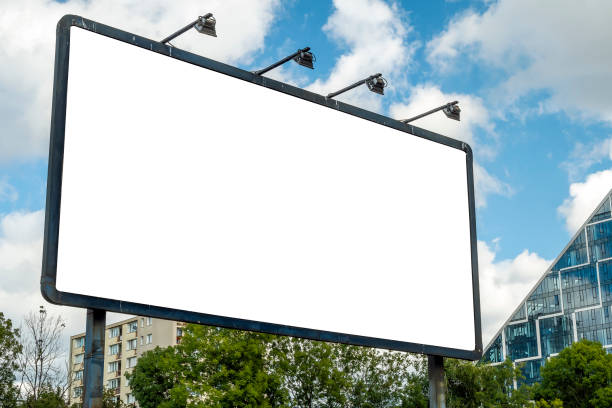 istock Blank white billboard for advertisement in front of modern office building with glass facade 1397038845