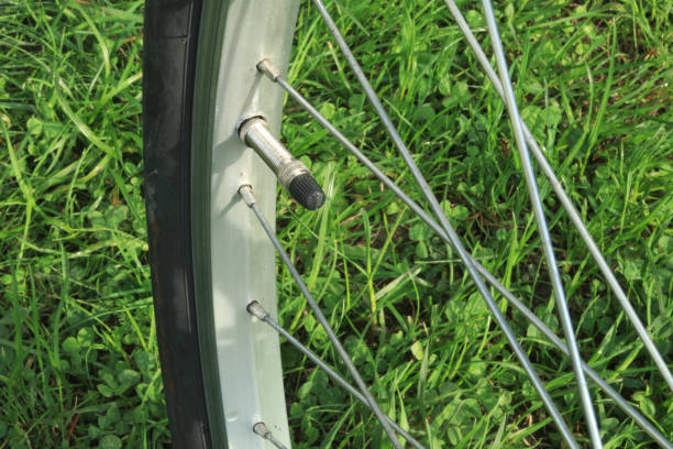 istock Inflating a punctured bicycle wheel 1397039080