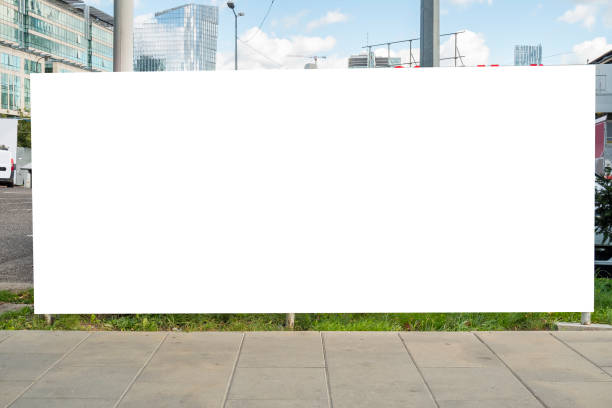 istock Blank white billboard for advertisement in downtown on a sunny summer day 1397039247