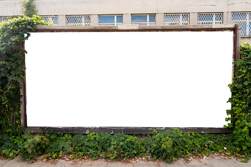 Blank white advertising billboard in the city