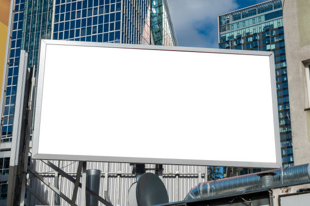 istock Blank white advertising billboard in front of modern office buildings 1397040143