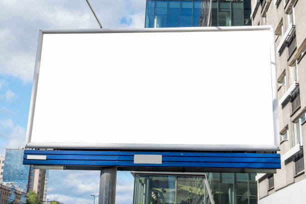 istock Blank white billboard for advertisement in downtown on a sunny summer day 1397040164