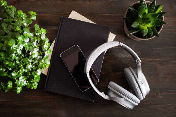 istock audiobook concept modern wireless headphones smartphone book 1397040425