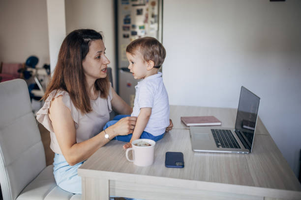 istock Mother working from home with kid 1397041319