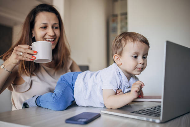 istock Mother working from home with kid 1397041469