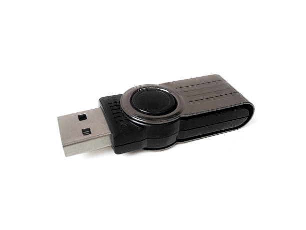istock Black and silver USB stick isolated on white background 1397042363