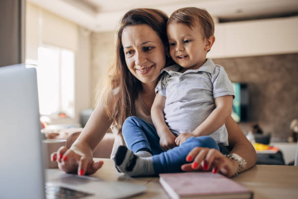 istock Mother working from home with kid 1397042525