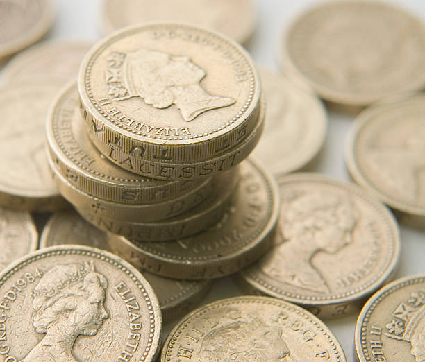 istock Pile of pound coins 139704256