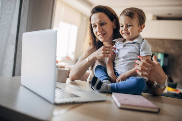 istock Mother working from home with kid 1397042569
