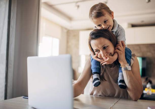 istock Mother working from home with kid 1397042772