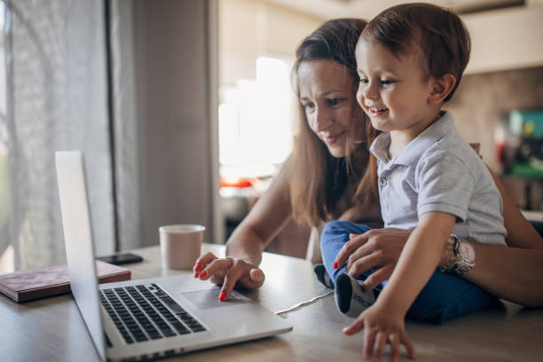 istock Mother working from home with kid 1397043127