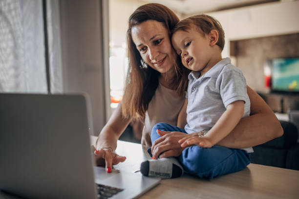 istock Mother working from home with kid 1397043139