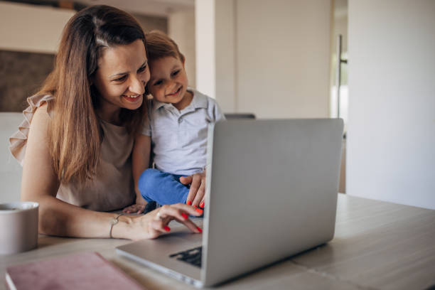 istock Mother working from home with kid 1397043147