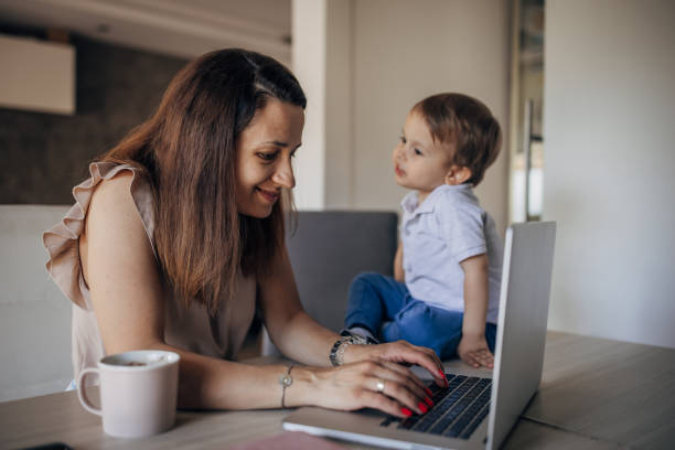 istock Mother working from home with kid 1397043338