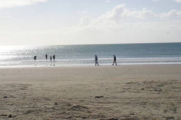 muslim family at beach stock photo