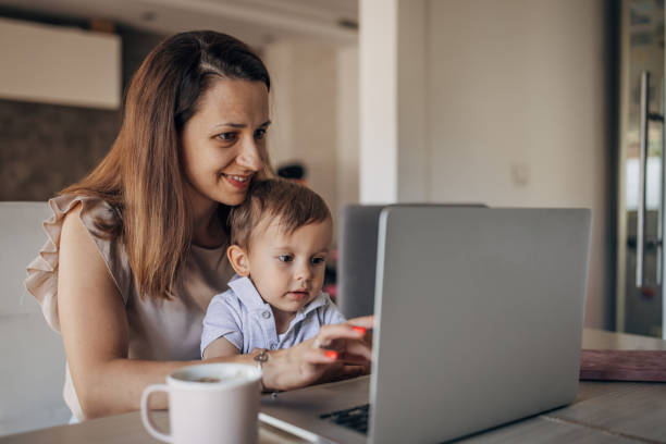 istock Mother working from home with kid 1397044037