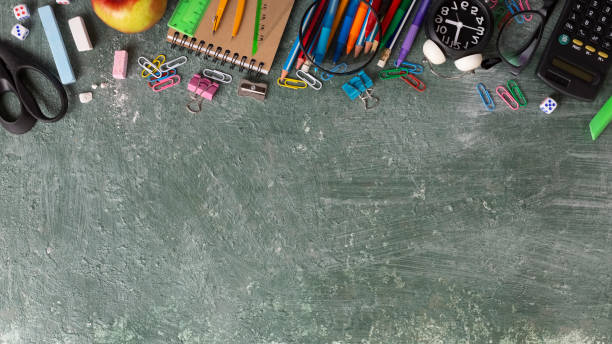 istock School background with school supplies and copy space 1397044930