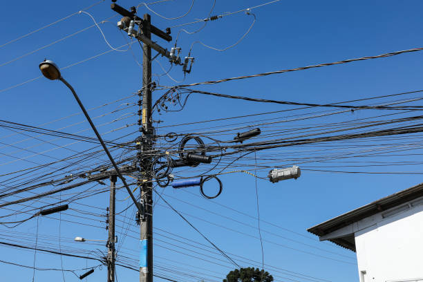 istock Street light pole with a tangle of wires 1397046769