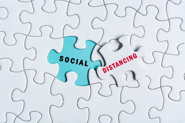 istock Social distancing text on Jigsaw Puzzle. Pandemic concept 1397048107