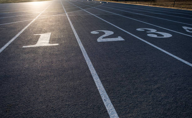 istock Numbered Lanes of a Track and Field Starting Point 1397048199