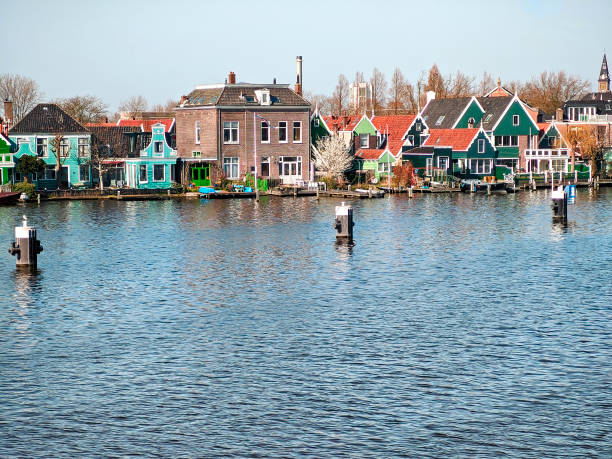 ancient house neat to the river by Zaanse Schans town in netherlands, travel reportage