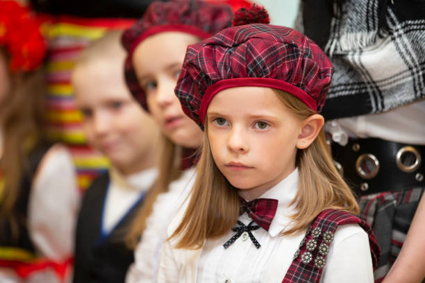 little girl in scottish costume. - plaid tartan scottish culture celtic culture imagens e fotografias de stock