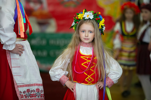Ukrainian or Belarusian little girl in national costume.