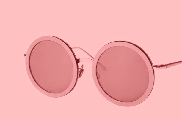 istock Pink sunglasses on a pink background. 1397051581