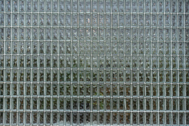 Glossy glass blocks pattern of vintage wall background. Exterior partition building