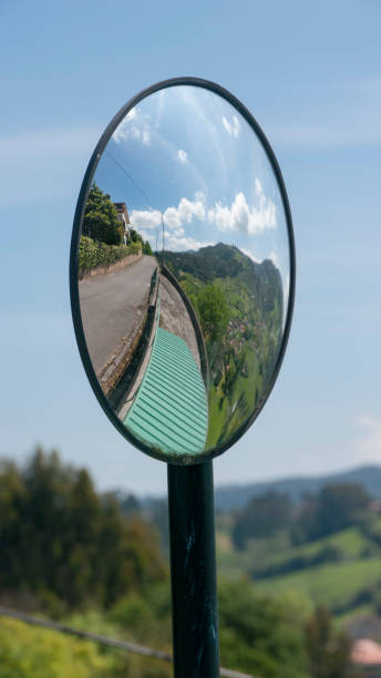 istock Convex safety traffic mirror in rural area 1397052907
