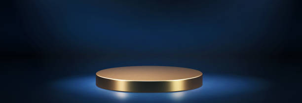 istock Golden colour low round empty podium lit by spotlight. 3d computer graphic template of displaying place for your products. 1397054086