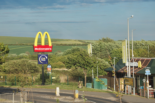 Newhaven, United Kingdom - May 04, 2022: McDonald's restaurant in Newhaven, United Kingdom. McDonald's is the main fast-food restaurant chain in the world.