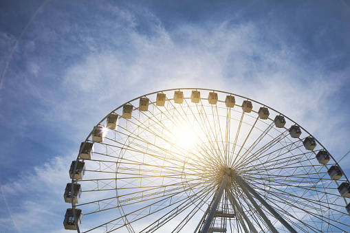 Sun and Ferris wheel