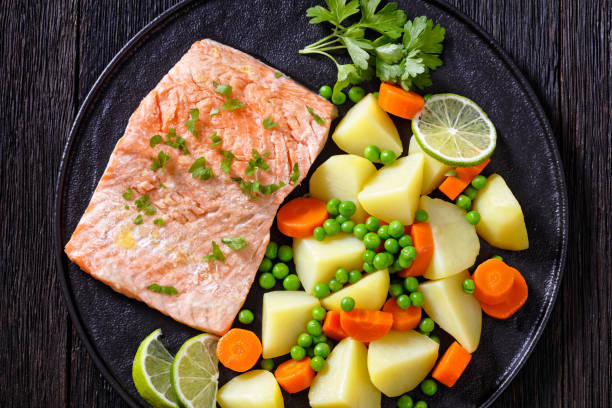 istock Multi Cooker salmon, carrots, peas and potatoes 1397055334