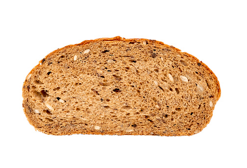 Piece of brown multigrain bread isolated on white