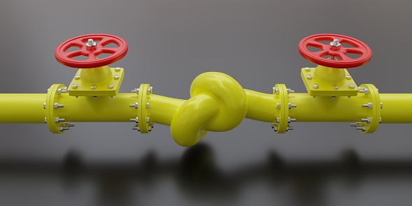 Gas conflict concept. Natural gas pipeline yellow color with a knot on gray background. The pipe valve is closed, fuel crisis. 3d render