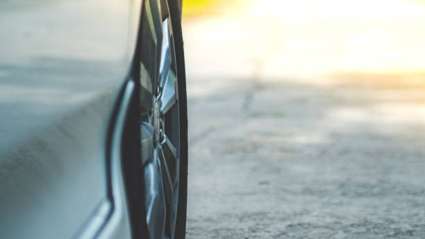 istock Car wheels and tires close up 1397062699