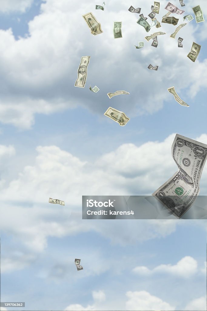 Windfall Dollars falling from the sky Pennies from Heaven Stock Photo