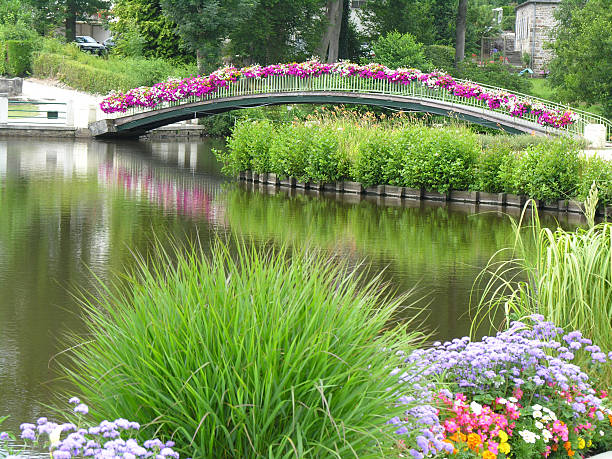 Flower bridge Bridge of flowers in france, like a painting of Monet. foundation claude monet photos stock pictures, royalty-free photos & images