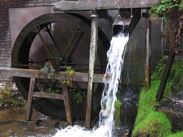 istock Waterwheel with flowing water 139706705