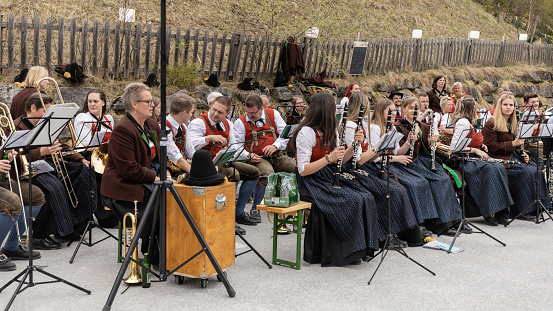 village ensemble plays on the holiday of May 1, Austria