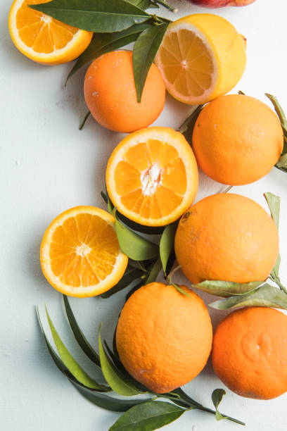 Healthy fruits, orange fruits background.  Slices of citrus fruits - oranges. stock photo
